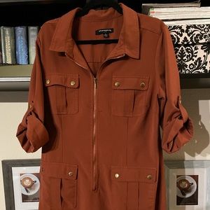 Rust colored midi dress with gold zipper